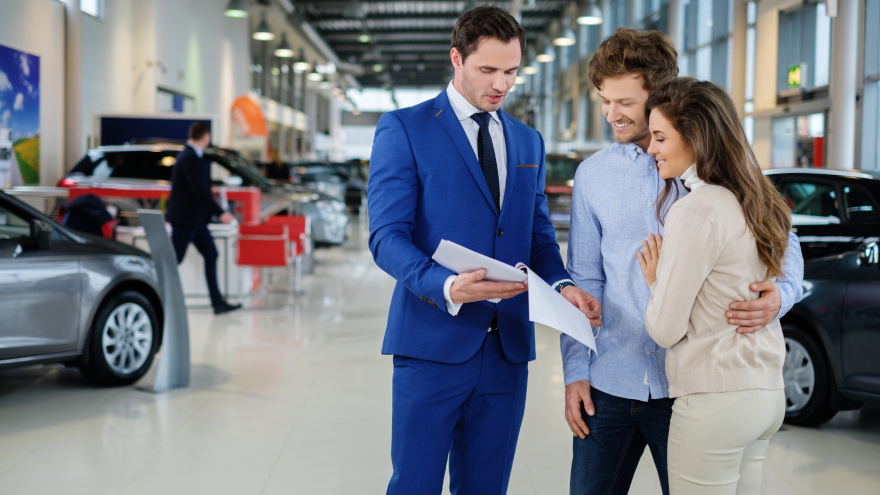 couple at dealership